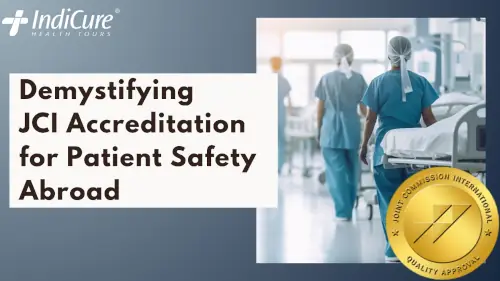Title slide for the article 'Demystifying JCI Accreditation for Patient Safety Abroad.' The image features two medical professionals in surgical scrubs walking down a bright hospital corridor and includes the IndiCure Health Tours logo and the Joint Commission International (JCI) Gold Seal of Quality Approval.